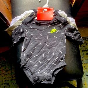 NWT Nike 6 month long sleeve onesies.